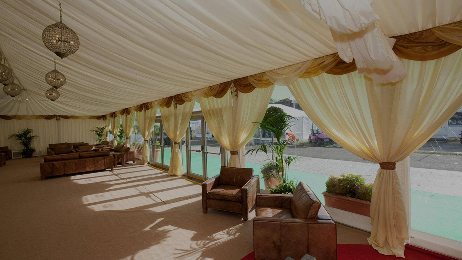 Luxury marquee interior with elegant furniture and chandeliers