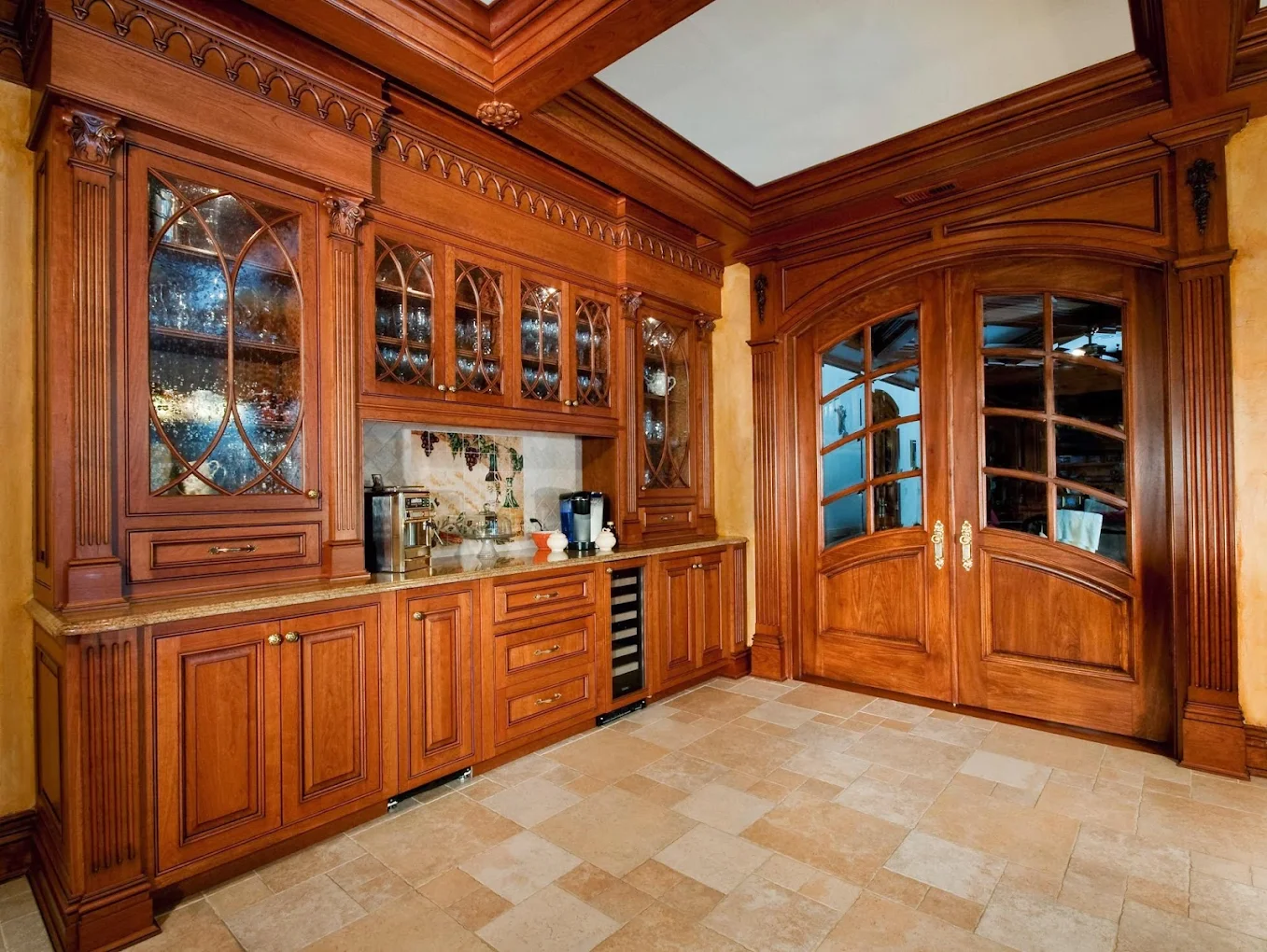 Custom bar and cabinetry with Gothic details